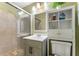 Bathroom featuring a shower and tile flooring, vanity, and built in storage at 4070 Lauada Dr, Douglasville, GA 30135