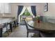 Relaxing dining nook by kitchen with table and chairs and sliding glass door at 4070 Lauada Dr, Douglasville, GA 30135