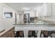 Beautiful kitchen with white cabinets, granite countertops, and stainless steel appliances at 4070 Lauada Dr, Douglasville, GA 30135