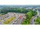 Aerial view of a well-manicured community with townhomes at 241 Irwell Path, Lawrenceville, GA 30044