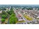 Aerial view of a beautiful community with townhomes with mature trees at 241 Irwell Path, Lawrenceville, GA 30044