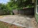 Backyard featuring a concrete slab and wooden fence at 490 Rockwell Sw St, Atlanta, GA 30310