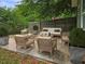 A charming backyard with a patio area set up for outdoor relaxation and entertaining at 490 Rockwell Sw St, Atlanta, GA 30310