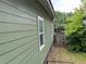 A house with dark green siding and white trim at 490 Rockwell Sw St, Atlanta, GA 30310