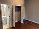 A bedroom showing a full ensuite bathroom and closet at 490 Rockwell Sw St, Atlanta, GA 30310