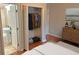 A bedroom boasts a convenient closet and adjacent bathroom at 490 Rockwell Sw St, Atlanta, GA 30310