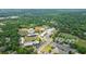A beautiful aerial view of the entire school campus surrounded by a lush green wooded landscape at 5120 Jett Forest Trl, Atlanta, GA 30327