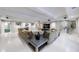 Expansive basement featuring a modern living area, a fireplace, and a stylish bar area at 5120 Jett Forest Trl, Atlanta, GA 30327