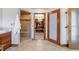 Bathroom area with step-in shower and doorway leading to walk-in closet at 5120 Jett Forest Trl, Atlanta, GA 30327