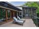 Outdoor deck with lounge chairs and a grill with a view of the house exterior and outdoor space at 5120 Jett Forest Trl, Atlanta, GA 30327