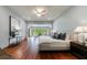 Spacious main bedroom suite with hardwood floors, lots of natural light, and sitting area at 5120 Jett Forest Trl, Atlanta, GA 30327