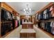 Large walk-in closet with custom shelving and ample storage space at 5120 Jett Forest Trl, Atlanta, GA 30327