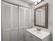 Bathroom featuring a mirror and closet with shutter style folding doors at 157 Jousters Ln, Lawrenceville, GA 30044