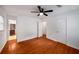 Bedroom with hardwood floors and ensuite bathroom at 157 Jousters Ln, Lawrenceville, GA 30044