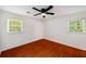 Bedroom with hardwood floors and natural light at 157 Jousters Ln, Lawrenceville, GA 30044