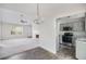 Open concept kitchen view with stainless steel appliances and granite counters at 332 Christian Ln, Carrollton, GA 30116