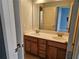 Bathroom featuring double sink vanity with large mirror at 3943 Dunaire Dr, Stone Mountain, GA 30083