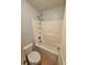Bathroom featuring tub and toilet at 3943 Dunaire Dr, Stone Mountain, GA 30083