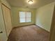 Bright bedroom with double closet and natural light from a large window at 3943 Dunaire Dr, Stone Mountain, GA 30083