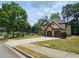 Lovely two-story home with a two-car garage, large driveway, and well-maintained landscaping at 3943 Dunaire Dr, Stone Mountain, GA 30083