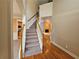 Inviting foyer with hardwood floors and staircase leading to the upper level at 3943 Dunaire Dr, Stone Mountain, GA 30083