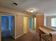 Hallway with multiple doorways, a desk area, and carpet at 3943 Dunaire Dr, Stone Mountain, GA 30083