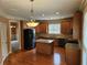 View of a spacious kitchen with an island, stainless appliances, and lots of cabinet space at 3943 Dunaire Dr, Stone Mountain, GA 30083