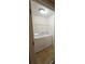 Convenient laundry area with washer, dryer, and wire shelving for storage at 3943 Dunaire Dr, Stone Mountain, GA 30083
