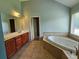 Relaxing main bathroom features soaking tub and lots of natural light at 3943 Dunaire Dr, Stone Mountain, GA 30083