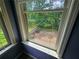 Outside view from the windows of the carpeted main bedroom at 3943 Dunaire Dr, Stone Mountain, GA 30083