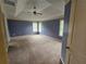 Spacious main bedroom with tray ceiling and natural light at 3943 Dunaire Dr, Stone Mountain, GA 30083