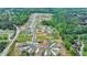 Extensive aerial view shows the neighborhood's well-planned layout, mature trees, and proximity to green spaces at 3985 Foxdale Ln, Cumming, GA 30028