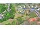 This home is perched on the perimeter of its neighborhood in a lush wooded location. Landscaping. Property Line at 3985 Foxdale Ln, Cumming, GA 30028