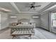 The main bedroom features a decorative ceiling, neutral color palette, and is carpeted at 3985 Foxdale Ln, Cumming, GA 30028