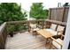 Outdoor deck featuring wooden furniture, perfect for relaxing or entertaining guests at 532 Walton Dr, Woodstock, GA 30188