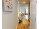 Hallway entrance leading to living room, with hardwood floors, and a plant at 532 Walton Dr, Woodstock, GA 30188
