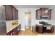 Kitchen features stainless steel appliances, quartz counters, and dark wood cabinetry at 532 Walton Dr, Woodstock, GA 30188