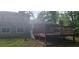 A spacious deck in a private backyard, perfect for outdoor entertaining and relaxation at 991 Park Creek Cir, Lawrenceville, GA 30044