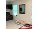 Relax in this main bedroom boasting a comfy recliner, natural light from the window, and a cozy pet bed for your furry friend at 210 Paris Dr, Lawrenceville, GA 30043