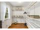 Spacious walk-in closet with custom shelving for ample storage and organization at 4716 N Springs Ct, Atlanta, GA 30338