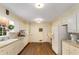 Well-lit kitchen with functional layout, ample cabinetry, and modern appliances at 4716 N Springs Ct, Atlanta, GA 30338