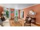 Cozy living room with large windows, stylish furniture, and hardwood floors, perfect for relaxation at 4716 N Springs Ct, Atlanta, GA 30338