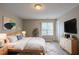 Bright bedroom with natural light, soft carpet, and ample space at 589 Arbor Ridge Dr, Stone Mountain, GA 30087