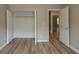 Bright bedroom featuring a closet and modern floors perfect for a serene retreat at 589 Arbor Ridge Dr, Stone Mountain, GA 30087