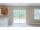 The dining area has sliding doors for easy access to a spacious backyard at 589 Arbor Ridge Dr, Stone Mountain, GA 30087