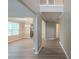 Open hallway with views to dining room, kitchen and upstairs at 589 Arbor Ridge Dr, Stone Mountain, GA 30087