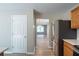 Bright kitchen with stainless steel refrigerator, updated appliances, and easy access to the dining room at 589 Arbor Ridge Dr, Stone Mountain, GA 30087