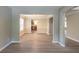 Open-concept living room space with lots of light at 589 Arbor Ridge Dr, Stone Mountain, GA 30087
