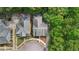 Beautiful aerial view of a home showcasing its landscaping and location in a cul-de-sac at 3800 Market Walk, Clarkston, GA 30021