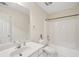 Bathroom featuring a single sink vanity, toilet, and a bathtub/shower combo at 3800 Market Walk, Clarkston, GA 30021